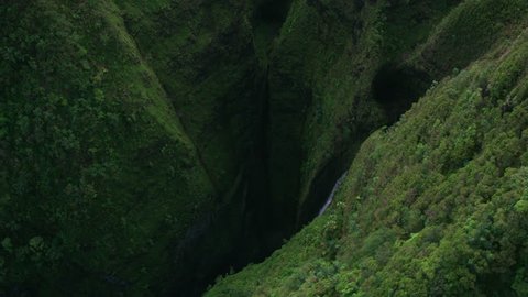 Oahu, Hawaii circa-2018. Aerial view of Sacred Falls. Shot with Cineflex and RED Epic-W Helium.