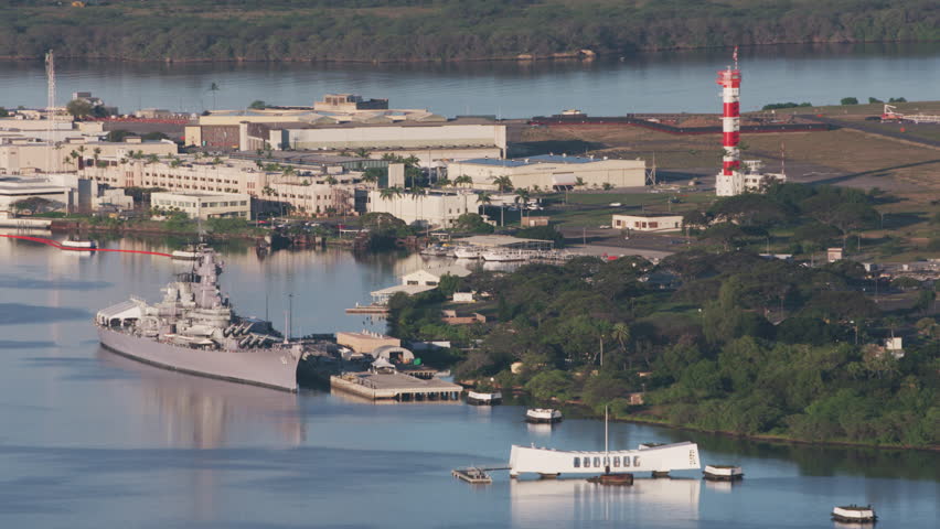 Oahu, Hawaii circa-2018. Aerial view of Pearl Harbor with USS Arizona Memorial and Battleship Missouri. Shot with Cineflex and RED Epic-W Helium.