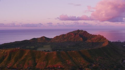 Honolulu, Oahu, Hawaii circa-2018. Aerial view of Diamond Head Crater at sunset. Shot with Cineflex and RED Epic-W Helium.