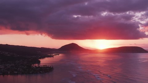 Honolulu, Oahu, Hawaii circa-2018, Beautiful sunset over Maunalua Bay with Koko Crater in distance. Shot with Cineflex and RED Epic-W Helium.