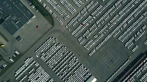 Aerial top down view of a new cars warehouse