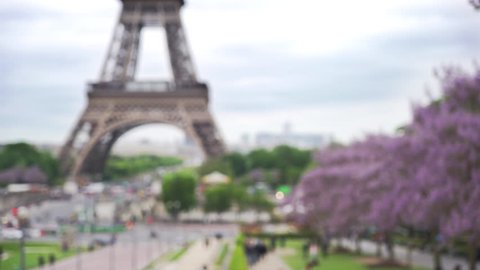 Scenic view of the Eiffel Tower on gloomy day in Paris. Lovely scene of world famous monument in France out of focus