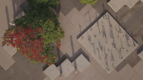 Abstract shadows of monument in Tel Aviv on the street 4k aerial drone footage