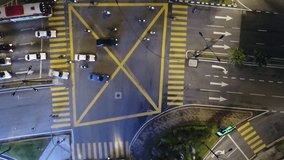 Aerial view of t-junction near Bukit Bintang. This clips footage was captured the transportation cross the traffic light during day night.