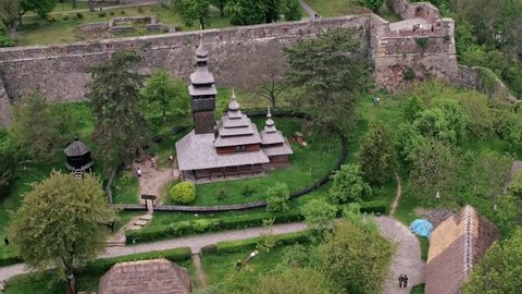 Aerial view museum of Folk Architecture and Life is an open-air museum located in Uzhhorod, Ukraine. It features over 30 traditional structures collected from villages across Zakarpattia Oblast.