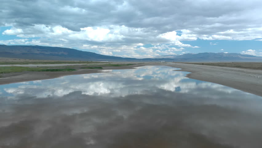 Aerial Shot of Death Valley Mountains Reflected on Lake California USA