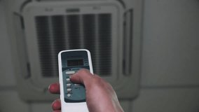 Air conditioning room temperature changing with remote control.