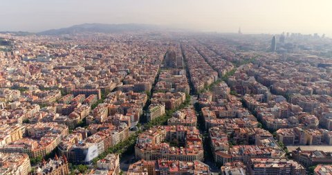 Aerial view of Barcelona city skyline with morning light, Spain. Cityscape with typical urban octagon blocks