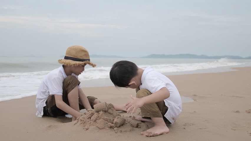 happy family with two kids on the beach, Happy family on sea beach at resort