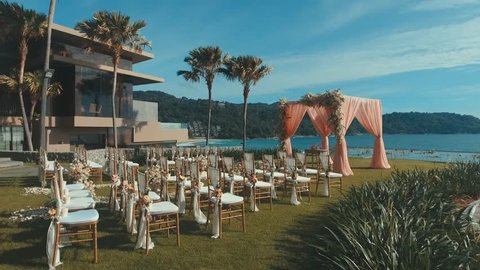 beautiful wedding setup on tropical beach background aerial drone shot of beautiful
