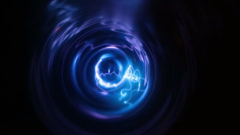 Plasma tunnel with blue and light blue flashes. Big electric shocks in an path. Blue lightning storm on a black background, electricity and power out of control. Energy, science and magic showed