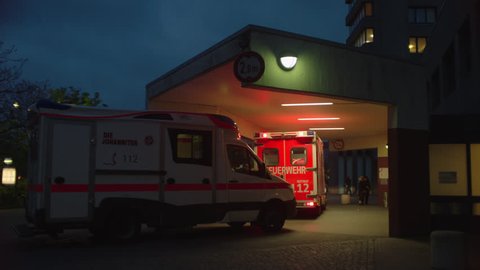 2 ambulances in front of hopsital. May, 2017 Berlin, Germany