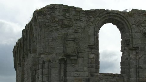 Saint Andrews, United Kingdom - May, 2016: A ruined stone wall with arched windows