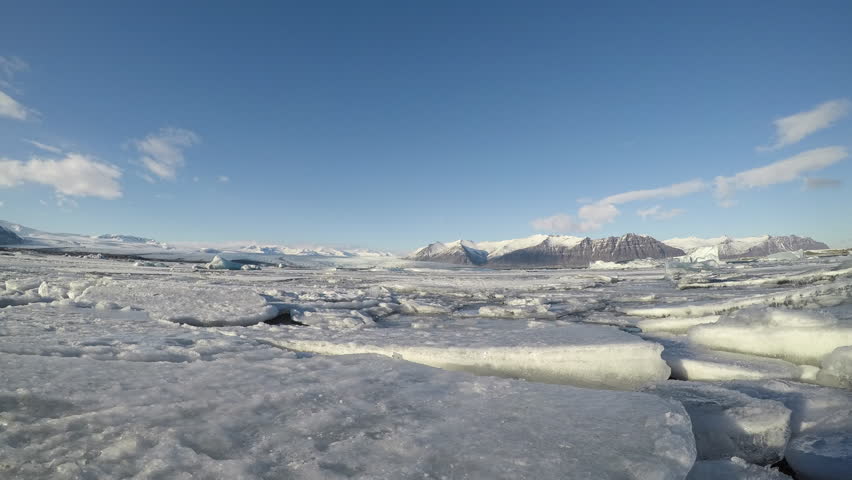 Time lapse wide angle view video of Jökulsárlón, a large glacial lake in southeast Iceland. It is also called Ice lagoon and it is considered as one of the natural wonders of Iceland.