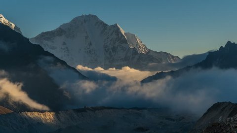 Time lapse beautiful clouds climb the mountain valley. Himalayas. Nepal, 4K zoom in