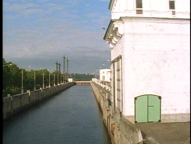 RUSSIA, 1999, POV Top of lock tower tilt down into lock, in Russia