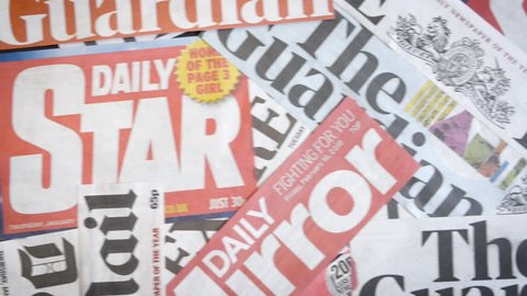 London, England - May 26, 2018: British Newspaper Titles Collage scrolling left to right