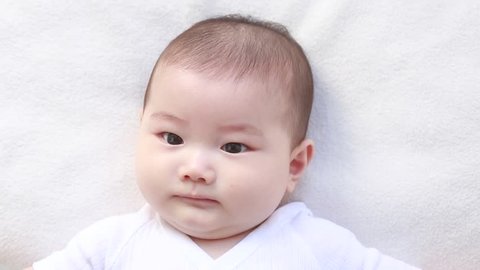 Little Baby Looking Into Camera Stock Footage Video 100 Royalty Free Shutterstock