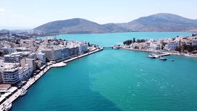 Aerial drone bird's eye view video from famous city of Chalkida with clear water seascape and traditional character, Evia island, Greece