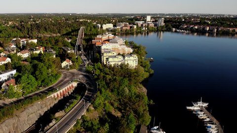 Aerial footage of the Stockholm island Stora Essingen and its tramway track bridge "Alviksbron"