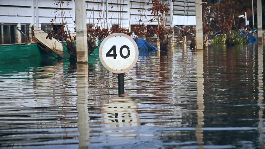 Thai flood hits Central of Thailand, Severe flooding occurred during the 2011 monsoon season in Thailand ,overflow water around City and road  in Bangkok, Thailand