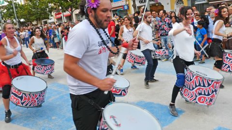 Torremolinos, Spain. Circa June 2018. Group of batucada street drummer in the gay pride parade.Slow motion.