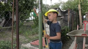 Cute Little Kid With Protective Glasses and Helmet in Slow Motion