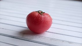 Water droplet on tomato fruits.