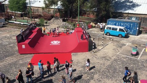 Skateboard Halfpipe High Angle View. LISBON, PORTUGAL - 05 MAI 2018; Teenagers learning how to skate on a halfpipe in a park. High angle view