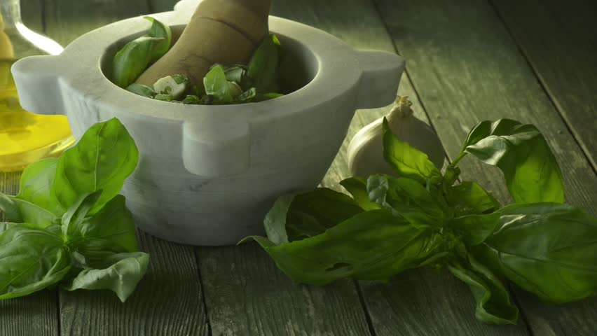 Genoise pesto sauce and ingredients on the wooden table