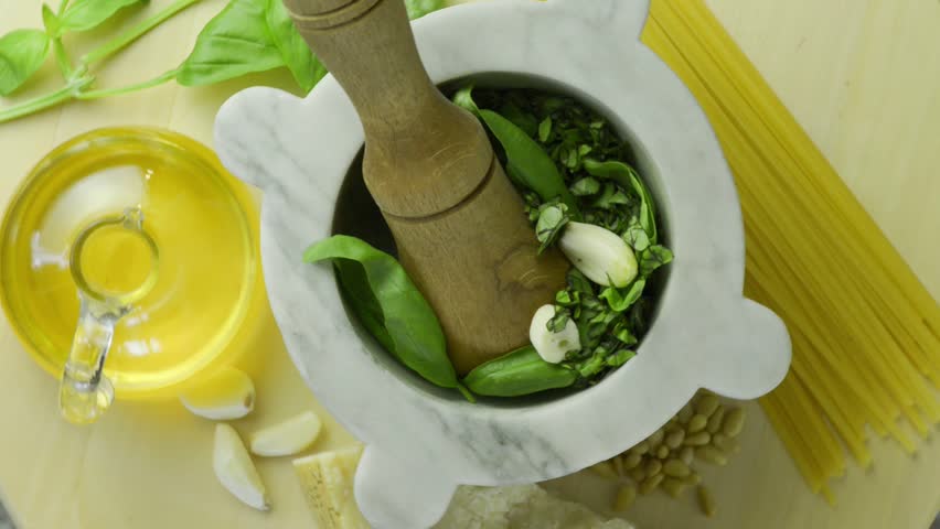 Genoise pesto sauce and ingredients on the wooden table