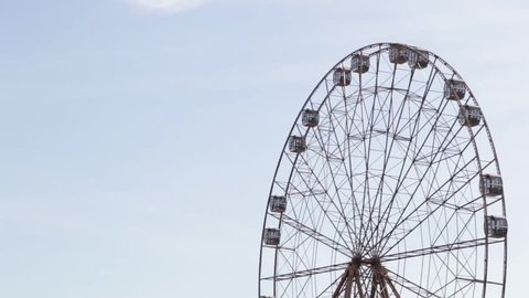 A large Ferris wheel against the sky. Attraction, amusement park.