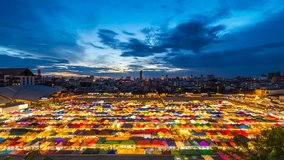 Time lapse of Colorful tents at night market in Bangkok, Thailand.