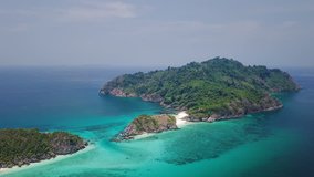 Aerial view of beautiful white sand beach and snorkel point at Cockburn island in Andaman sea near Ranong Thailand, Myanmar (Video from Drone)