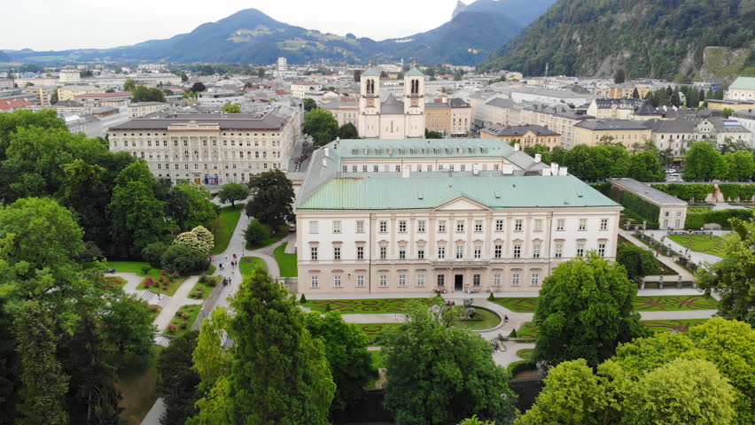 Aerial view of cityscape of old historic city of Salzburg, famous Mirabell Gardens and Palace in summer - landscape of Austria from above, Europe