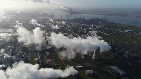 Aerial footage of nuclear power plant or nuclear power station a thermal power station in which the heat source is a nuclear reactor this plant is located in a heavy industrial zone 4k quality