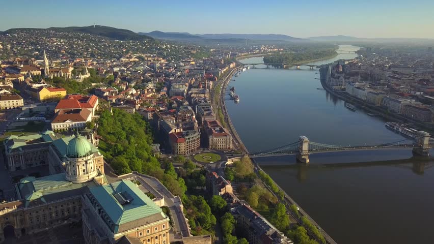 Budapest, Hungary - 4k aerial skyline view of Budapest with Buda Castle Royal Palace and Szechenyi Chain Bridge in the morning