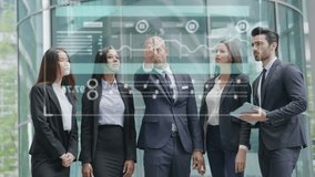 A group of business people talk about finance and economic trends looking at a 3D futuristic graph thanks to the holography. Concept of: team, augmented reality and future. - Powered by Shutterstock - Get 15% off with code: PIKWIZARD15