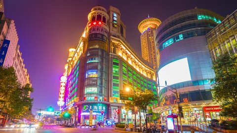 SHANGHAI, CHINA - SEPTEMBER 20 2017: night illuminated shanghai city center traffic street crossroad panorama 4k timelapse circa september 20 2017 
shanghai, china. 


