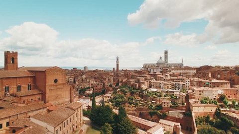 Drone: Flight over a medieval town of Siena, Tuscany, Italy