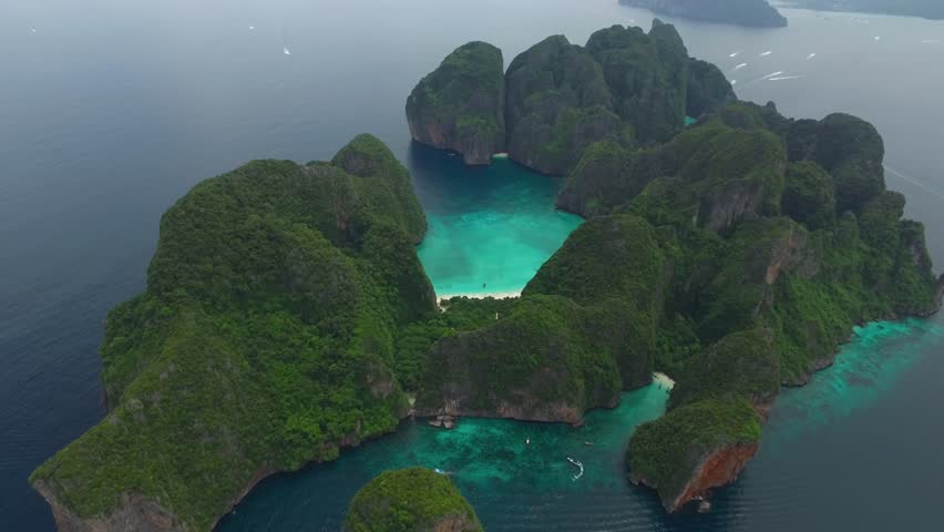 Aerial view of iconic tropical Maya Bay,Phi Phi islands, Thailand Royalty-Free Stock Footage #1012048646