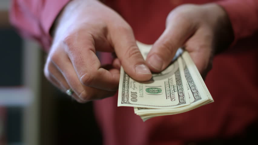 Man counting dollar bills. Close up of male hands count money cash. Money calculation. Employee salary. Cash money payment Successful business concept. American currency exchange in bank Royalty-Free Stock Footage #1012050545