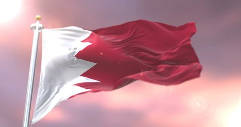 Bahrain flag waving at wind in slow at sunset, loop