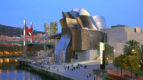 Bilbao / Spain - September 23 2018: Illuminated Guggenheim Museum at sunset.