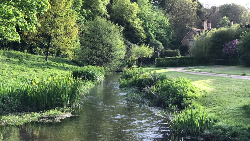 A peaceful scene at a North Cotswold village. Upper Slaughter, Gloucestershire, England.