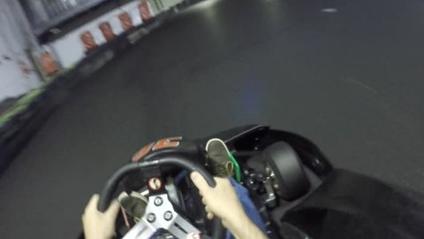 Go-kart race on an indoor circuit