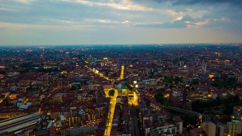 sunset illuminated milan cityscape famous canal aerial panorama 4k timelapse italy
