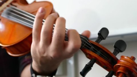 Close-up of musician playing violin, man playing violin ,