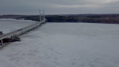 4K UHD Aerial Shot Revealing Frozen Lake/Sea in Finland