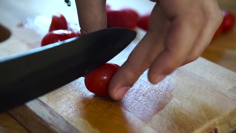 Close-Up of Cutting Tomatoes